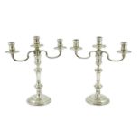 A modern pair of silver two branch, three light candelabra by William Comyns & Sons Ltd, height 35.