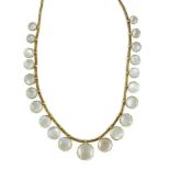 A gold and graduated twenty one stone cabochon moonstone set fringe necklace, 38cm, gross weight,