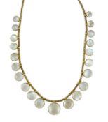 A gold and graduated twenty one stone cabochon moonstone set fringe necklace, 38cm, gross weight,