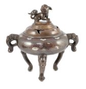 A Vietnamese silver inlaid bronze tripod censer and cover, 19th century, inlaid in silver and copper