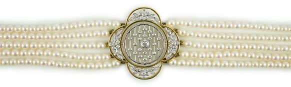 A quintuple strand seed pearl choker necklace, with pierced gold, platinum and diamond cluster set