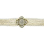 A quintuple strand seed pearl choker necklace, with pierced gold, platinum and diamond cluster set