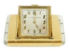 A French Lacloche Freres 18ct gold mounted travelling watch, of rectangular form, with Arabic dial