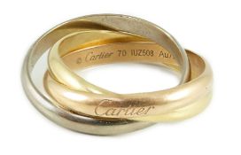 A Cartier triple band three colour 750 yellow metal Trinity Classique ‘’Russian’’ wedding ring,