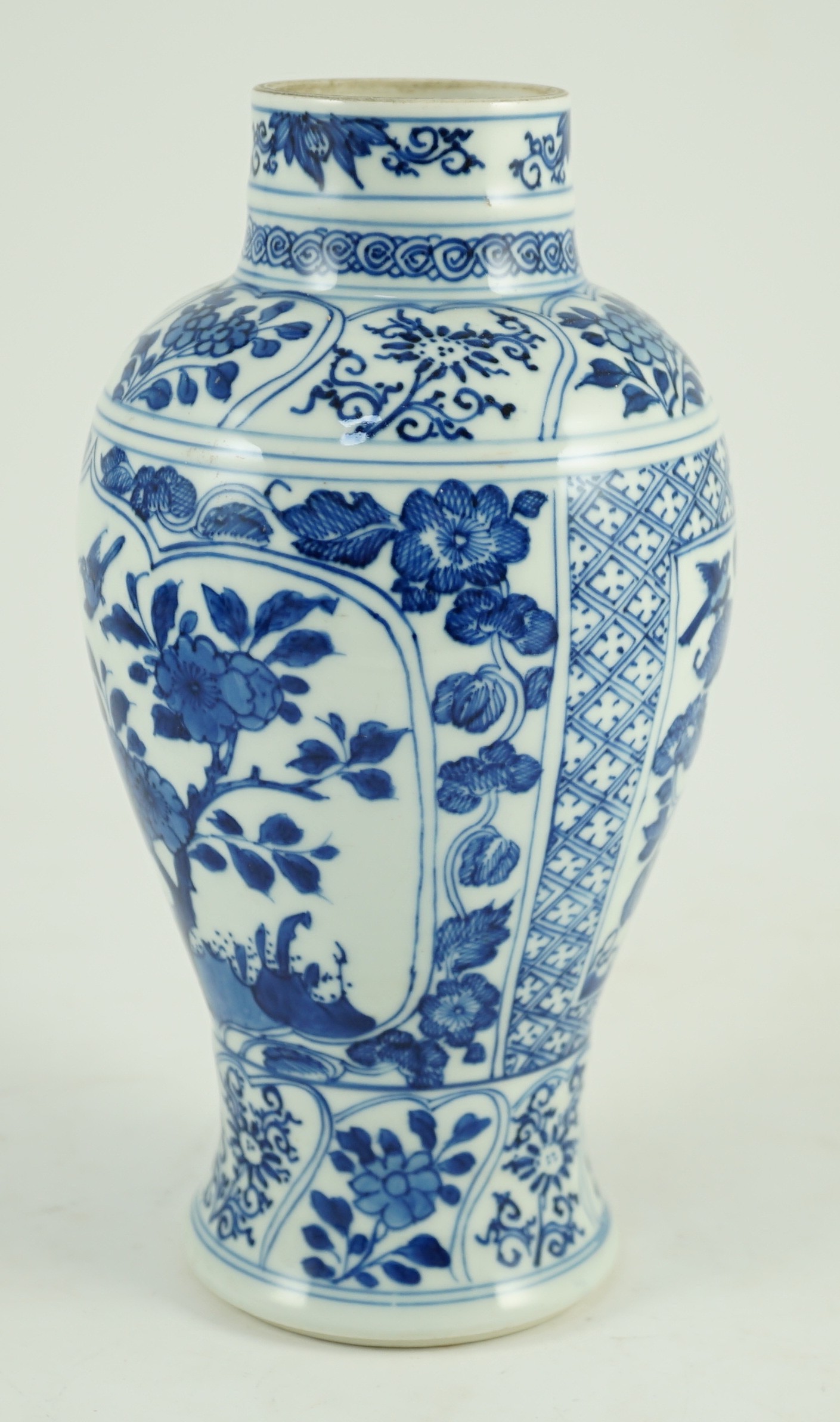 A Chinese blue and white vase, Kangxi period, painted with birds amid flowers and rockwork, within - Image 4 of 9