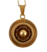 A Victorian gold circular pendant, with flower head centre and glazed back, on a later 9ct gold