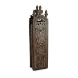 An antique carved oak cased tobacco rasp, the wall mounting case carved in relief with a crowned