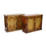 A pair of Victorian rosewood banded walnut collector's cabinets, with quarter veneered tops,