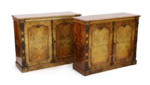 A pair of Victorian rosewood banded walnut collector's cabinets, with quarter veneered tops,