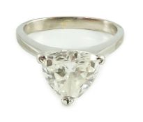 A modern platinum and solitaire trillion cut diamond set ring, the shaped shank stamped Yau Wing,