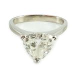 A modern platinum and solitaire trillion cut diamond set ring, the shaped shank stamped Yau Wing,