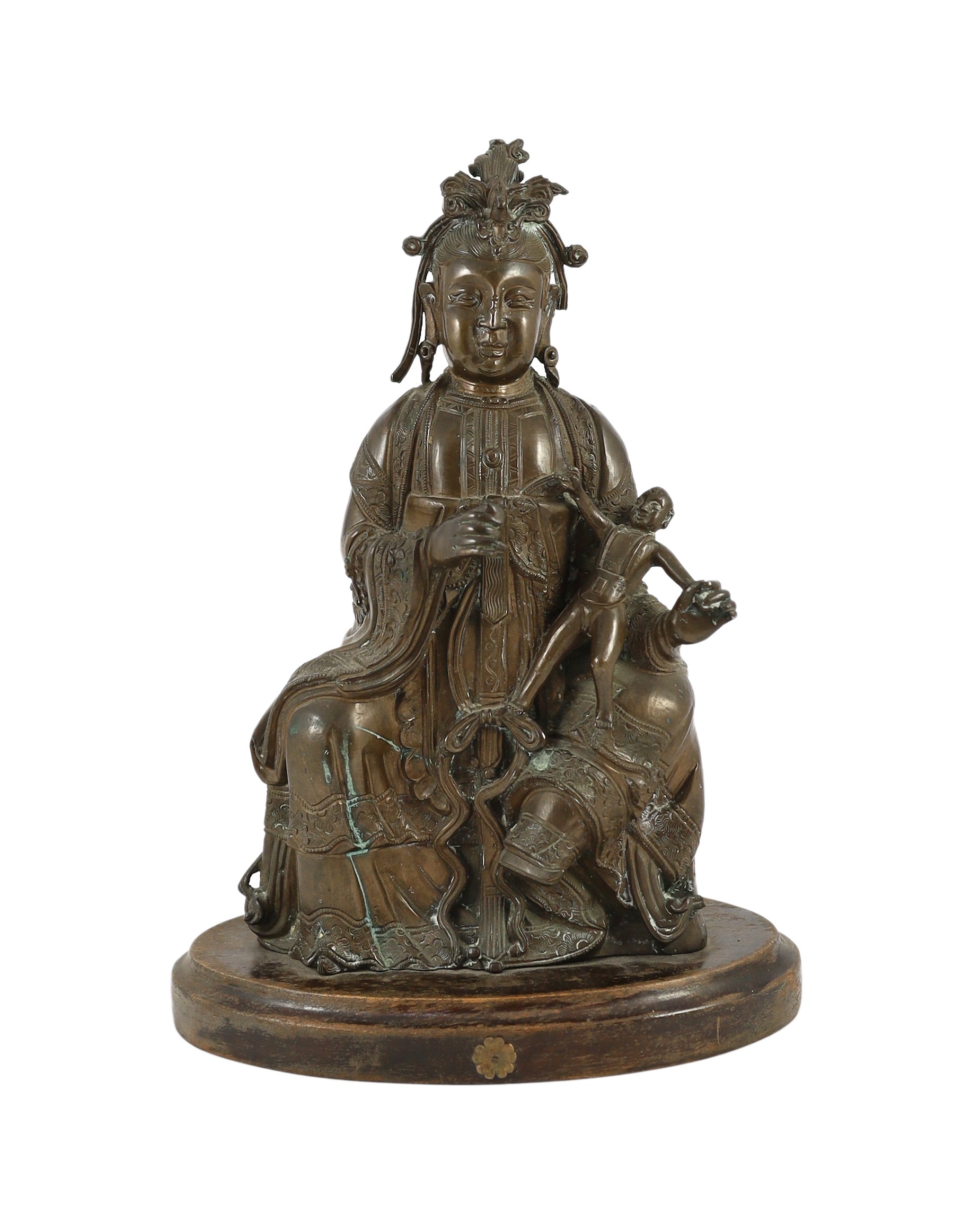 A large Chinese bronze group of Xi Wangmu and a child, late Ming dynasty, three column inscription