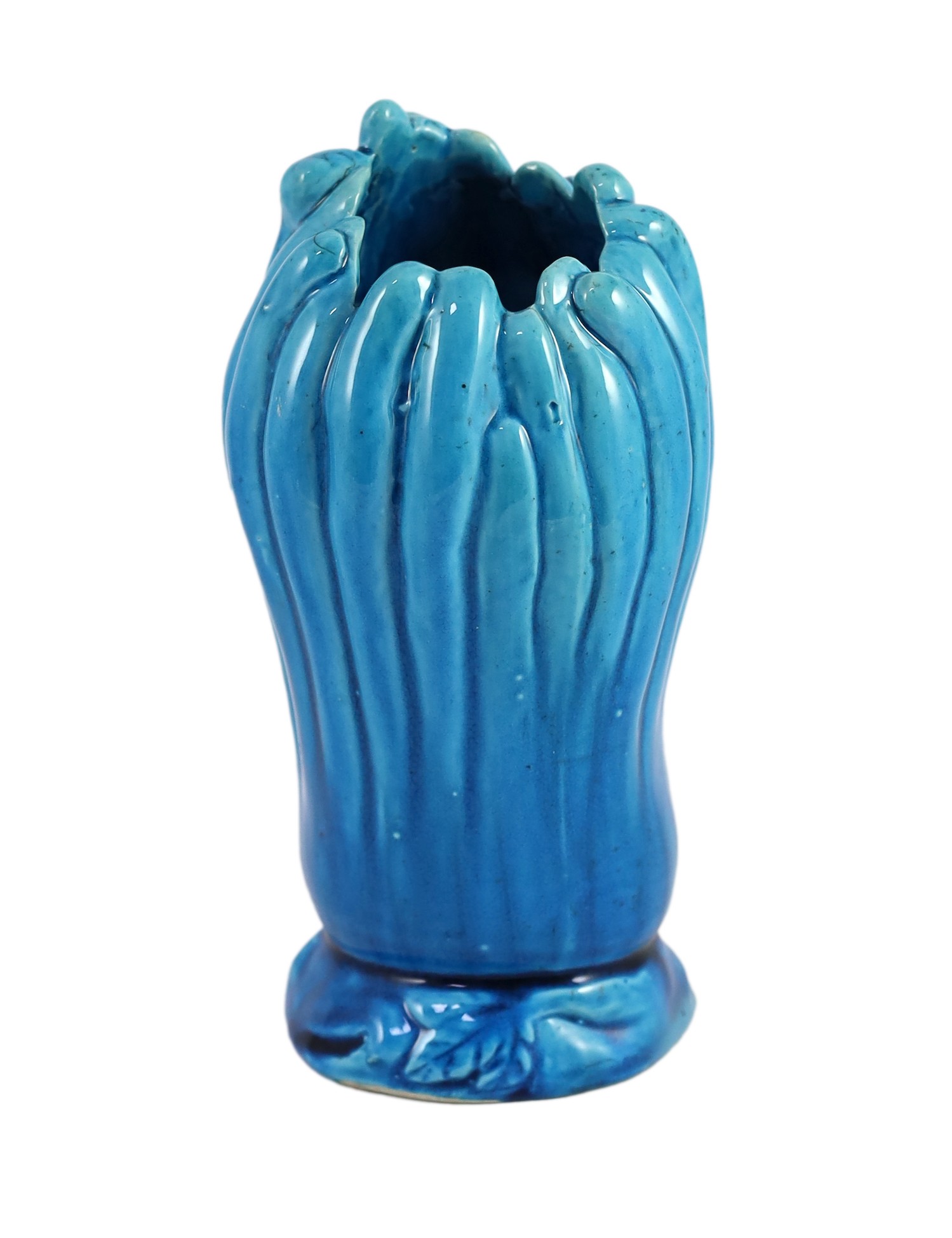 A Chinese turquoise glazed ‘finger citron’ vase, 18th century, unglazed biscuit base, 22cm high,