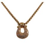 A modern French 18ct gold and pave set diamond 'U' shaped pendant, on a French 18ct gold chain,