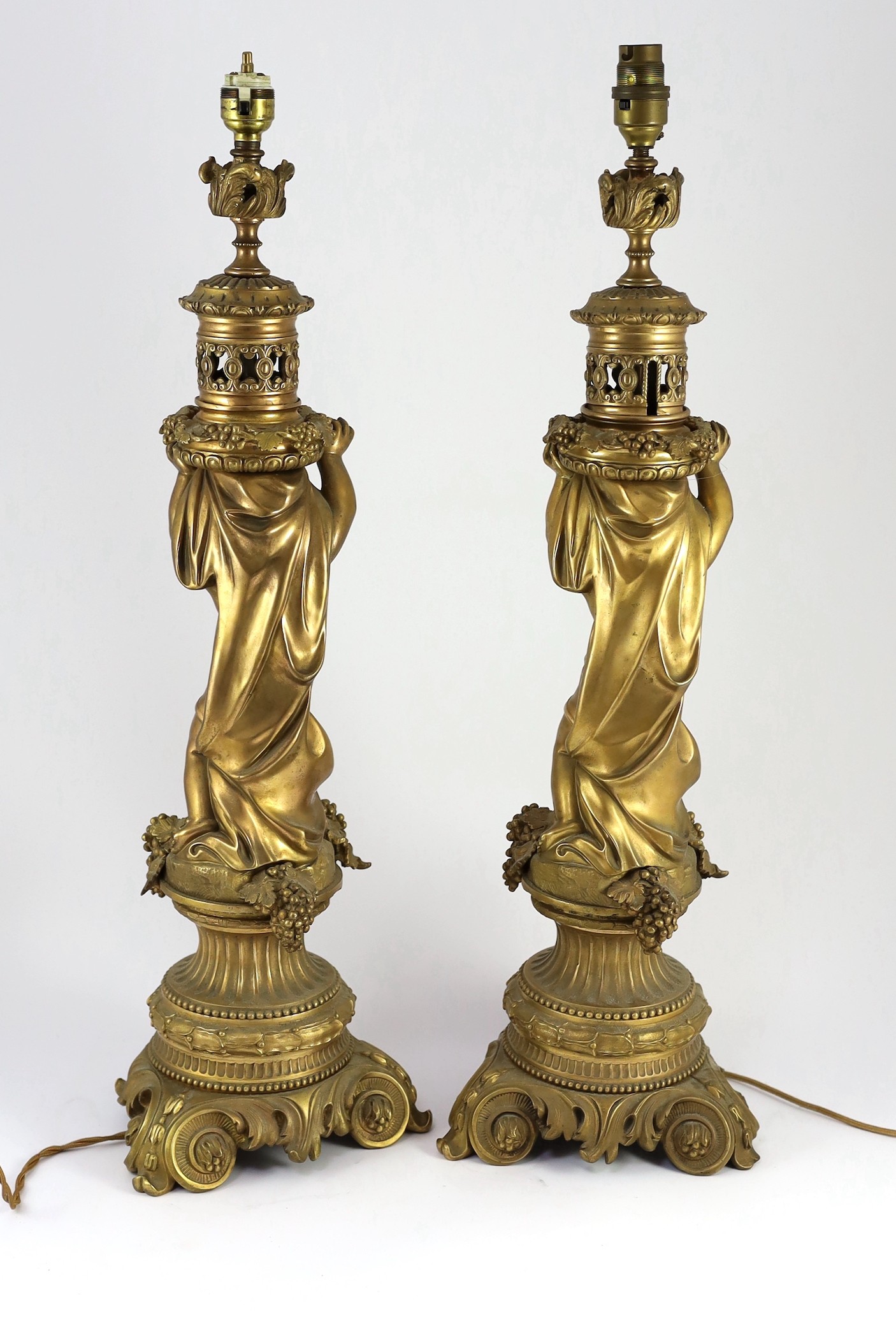 A pair of Victorian style ormolu table lamps, each with bacchic putto stem, on scroll feet, 50cm - Bild 7 aus 8