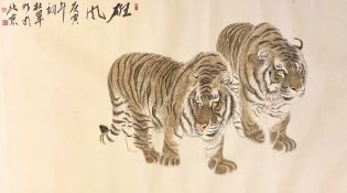 Chinese School, early 21st century, scroll painting on paper of two tigers, inscribed upper left and