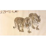 Chinese School, early 21st century, scroll painting on paper of two tigers, inscribed upper left and