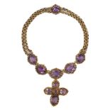 An early 19th century gold and eleven stone oval cut amethyst set pendant necklace and a similar