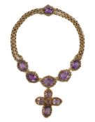 An early 19th century gold and eleven stone oval cut amethyst set pendant necklace and a similar