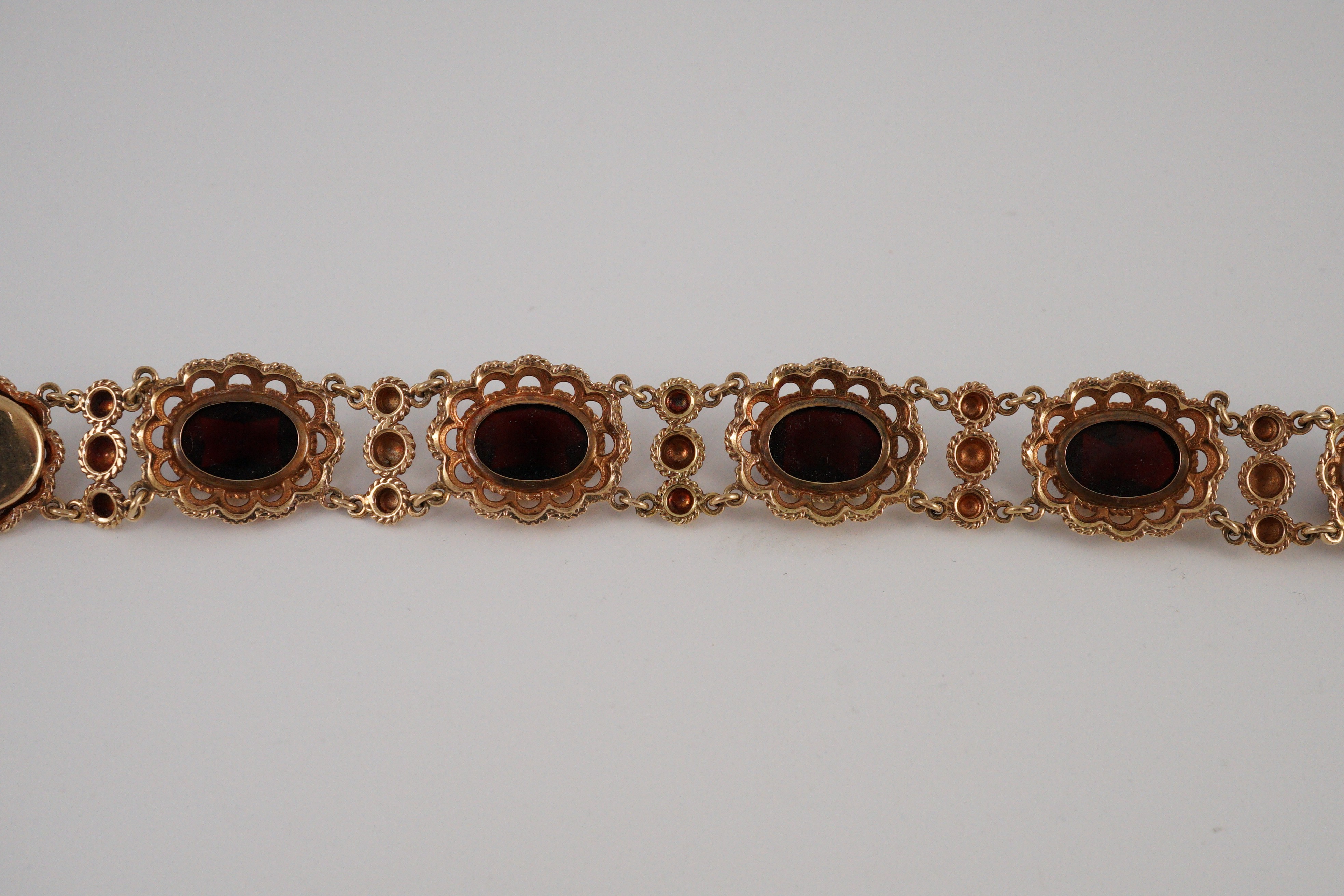 A 20th century Dutch 14k gold and six stone facet cut cabochon garnet set fancy link bracelet, 19cm, - Image 9 of 9