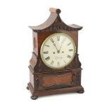 J. N. Hendry. A William IV carved mahogany pagoda top bracket clock, with enamelled signed Roman