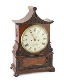 J. N. Hendry. A William IV carved mahogany pagoda top bracket clock, with enamelled signed Roman