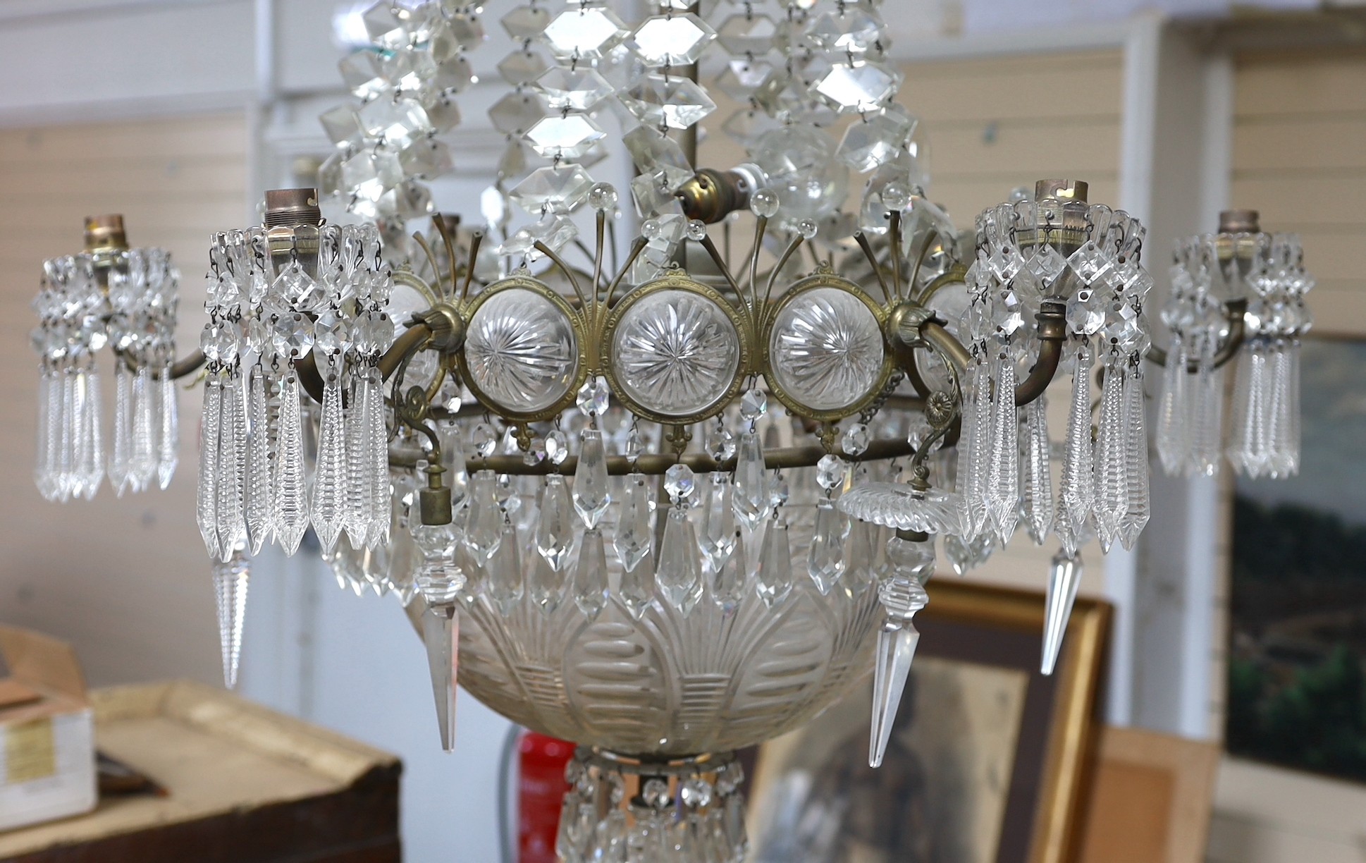 An Edwardian cut glass chandelier, with swagged top and lozenge shaped drops sweeping down to the - Image 2 of 4