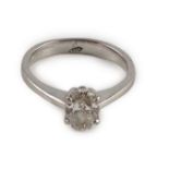 A modern platinum and solitaire oval cut diamond set ring, with a G.H. Pressley & Son insurance