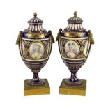 A pair of English porcelain Sevres style ormolu mounted vases and covers, mid 19th century, each