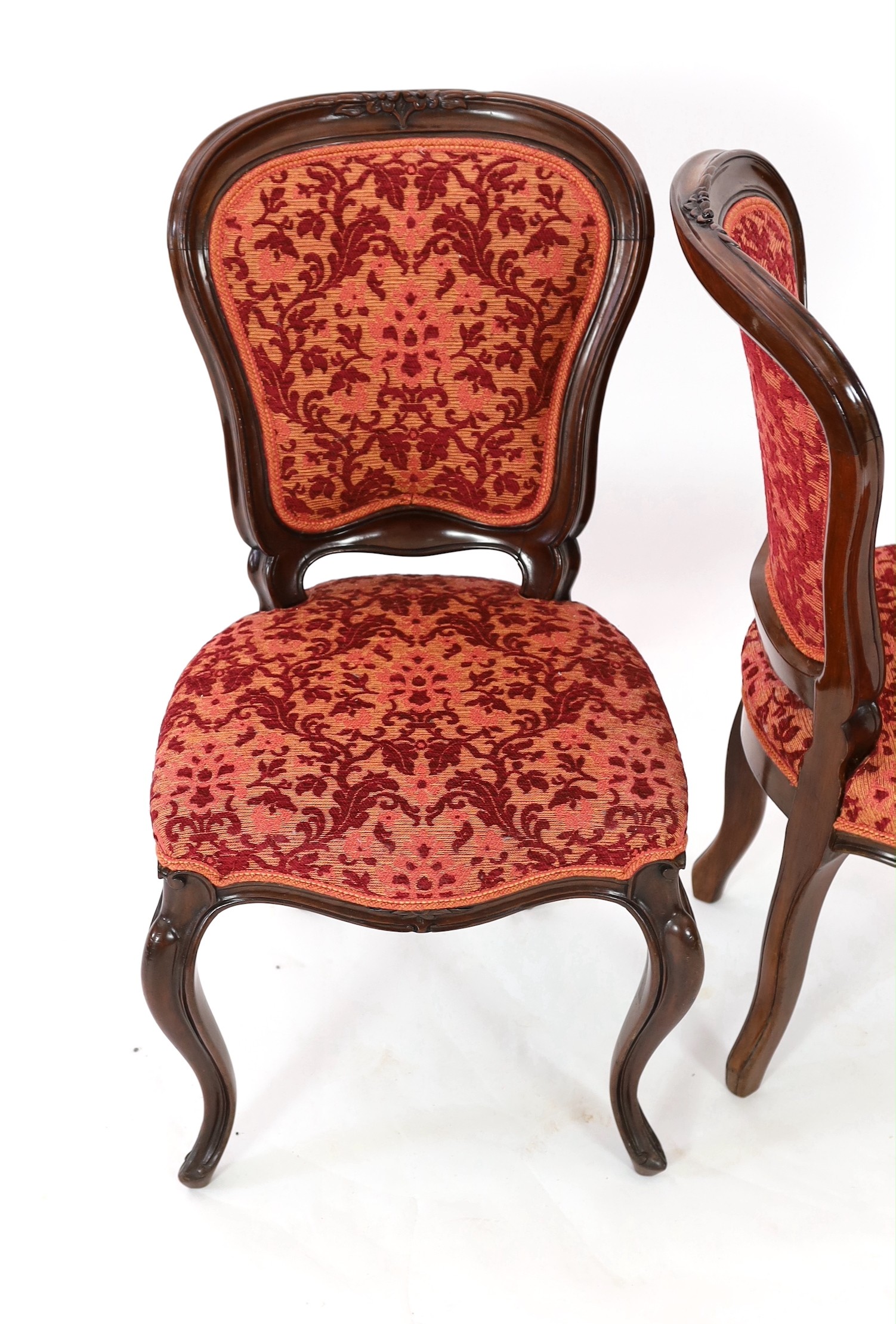 A set of twelve Victorian mahogany balloon back dining chairs, with floral carved show wood - Image 2 of 4