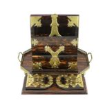 A Victorian brass mounted coromandel wood stationery casket with matching blotter, a similar book