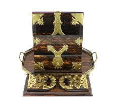 A Victorian brass mounted coromandel wood stationery casket with matching blotter, a similar book