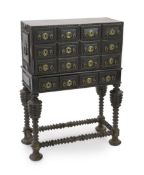 A 17th century Portuguese brass mounted ebonised rosewood Contador on stand, with twelve ripple