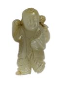A Chinese pale celadon jade figure of a boy, 19th century, standing and holding a lotus sprig in his