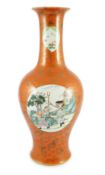 A Chinese coral ground vase, Qianlong mark but early 20th century, painted to three circular