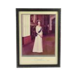 A signed colour photograph of Her Majesty Queen Elizabeth II, the Official Portrait taken by Peter