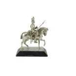 An early 20th century miniature model of a Royal Lancer on horseback, by The Goldsmiths and