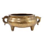 A large Chinese bronze censer, ding, 18th century, with sixteen character Xuande mark, applied