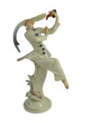 A Meissen figure of masked dancer from the ‘’Tales of Hoffmann’’, modelled by Scheurich, blue