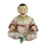 A Meissen figure of a nodding chinaman, 19th century, with weighted nodding head, moving tongue
