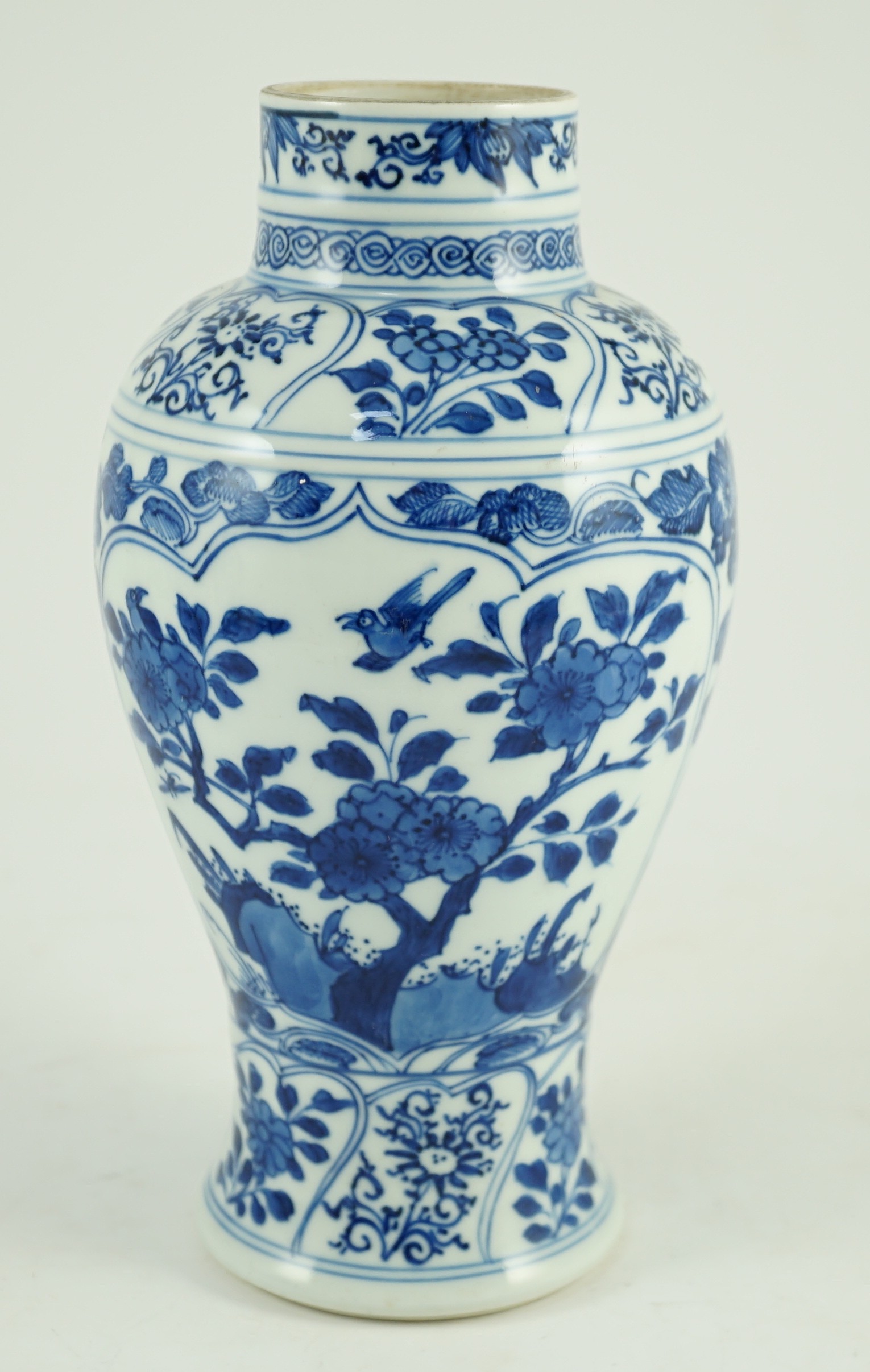 A Chinese blue and white vase, Kangxi period, painted with birds amid flowers and rockwork, within - Image 5 of 9