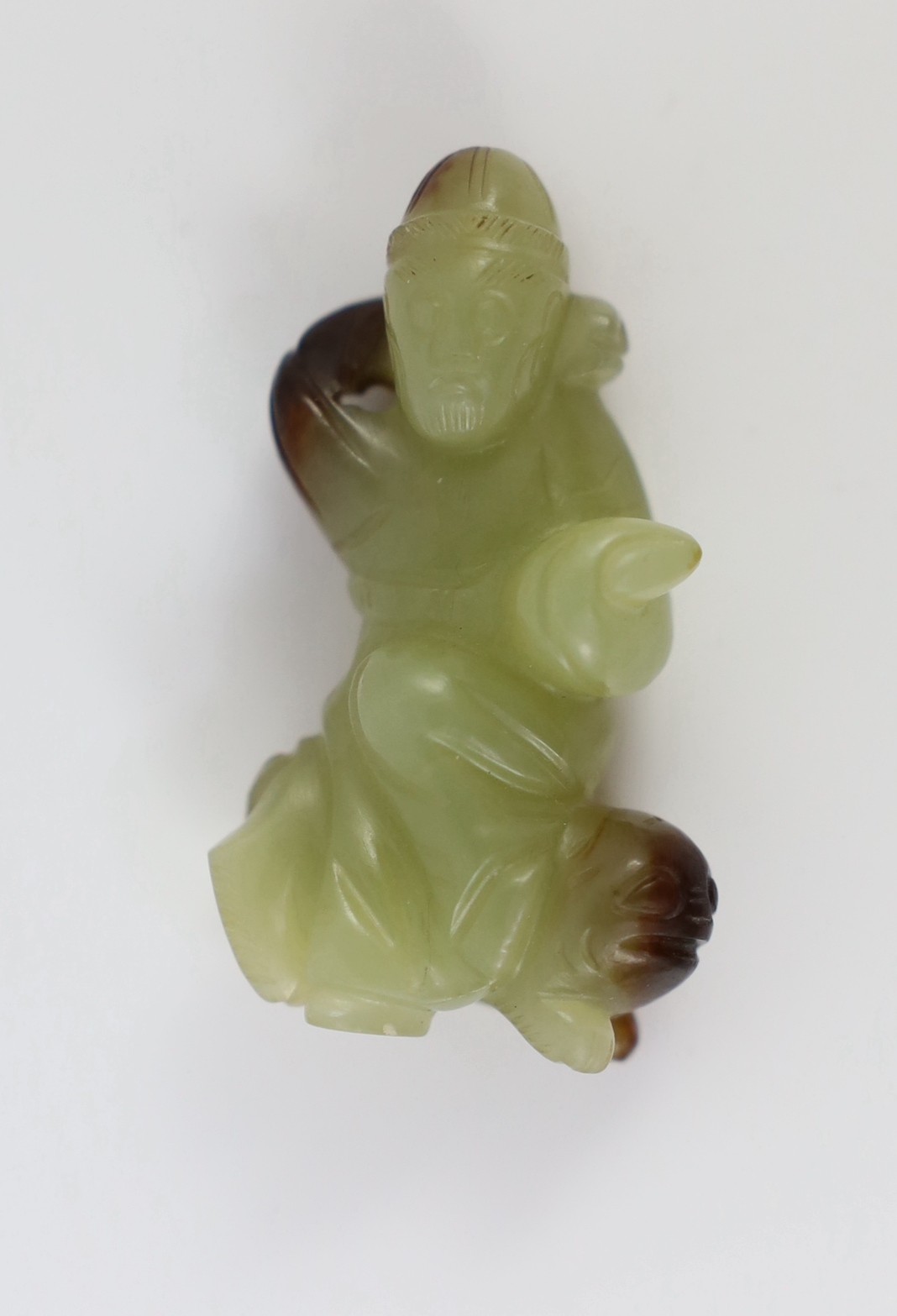 A Chinese yellow and brown jade figure of a man seated on a creature, 19th century, the greenish - Image 2 of 8