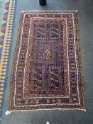 A Belouch blue ground rug, 156 x 102cm