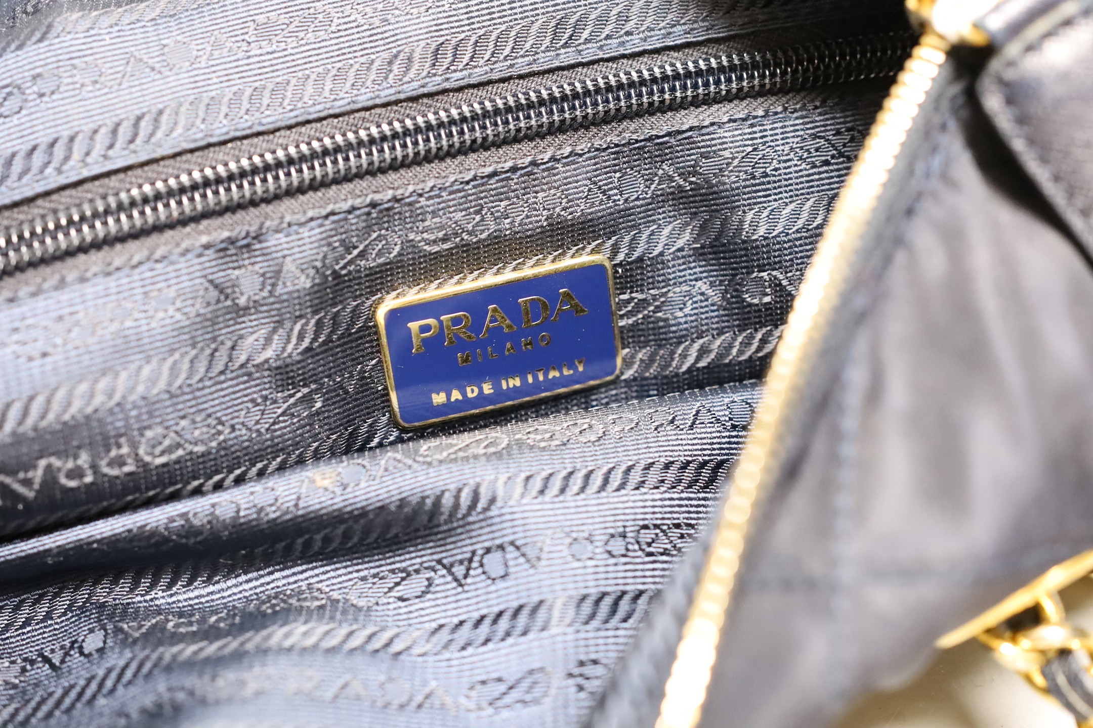 A vintage Prada nylon quilted shoulder bag with blue Prada Certificate of Authenticity, 30cm wide - Image 5 of 5