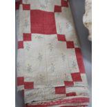 A mid to late 19th century hand stitched patch worked quilt,210 cms x 200 cms,