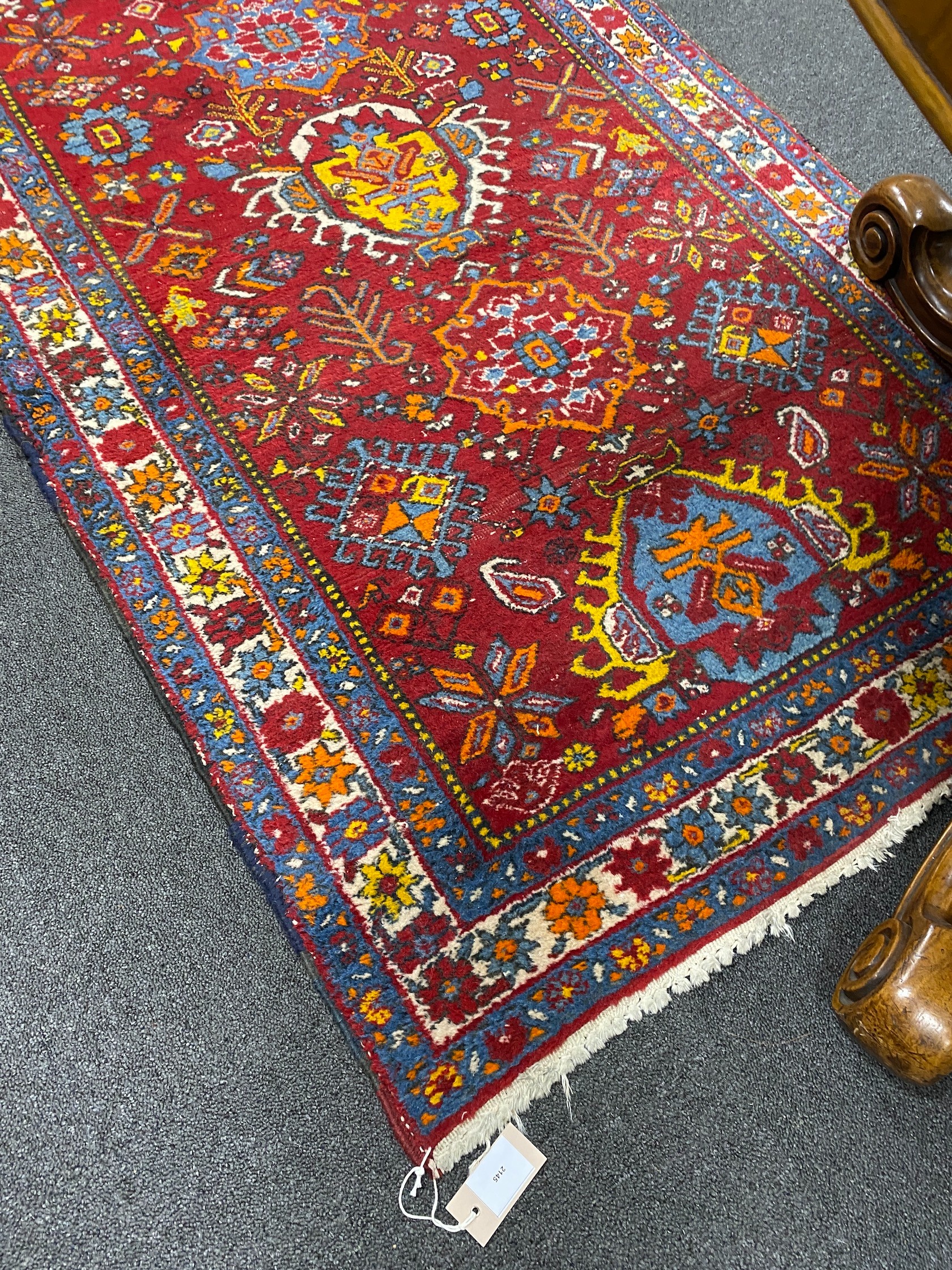A North West Persian red ground runner, 426 x 100cm - Image 2 of 5
