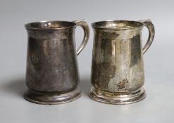 A pair 1970's silver mugs with S-scroll handles, by Asprey & Co Ltd, London, 1973, height 10.8cm,
