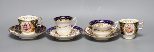 An early 19th century pair of Coalport coffee cups and saucer painted with pattern 793 and a New