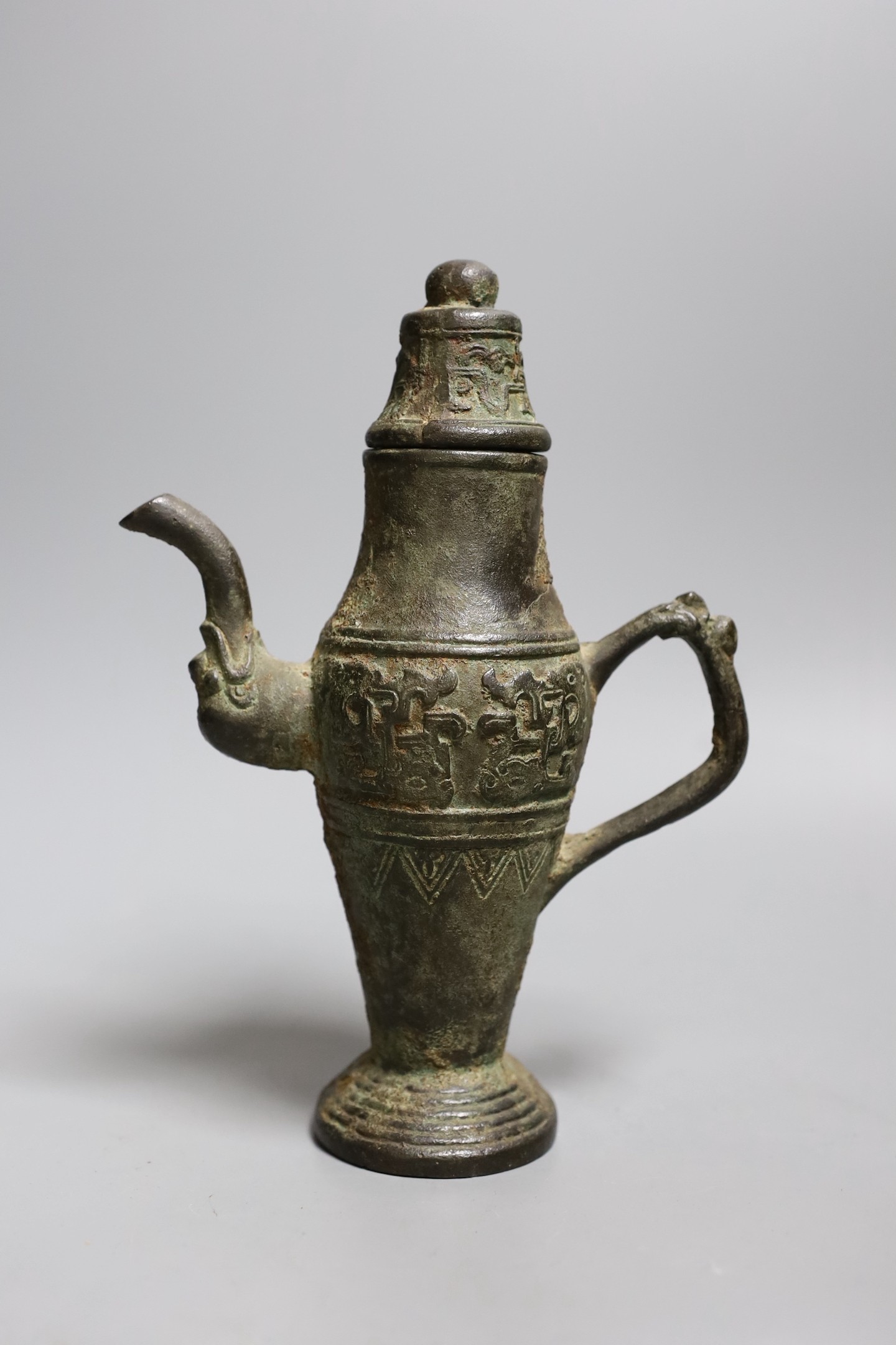 A Chinese archaistic bronze pouring vessel and cover, 17th/18th century,22cms high, - Image 2 of 4