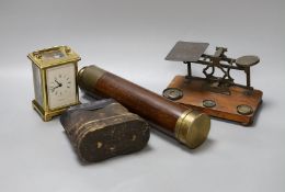 A five draw telescope, a pair of cased binoculars, postal scales and a brass timepiece,telescope